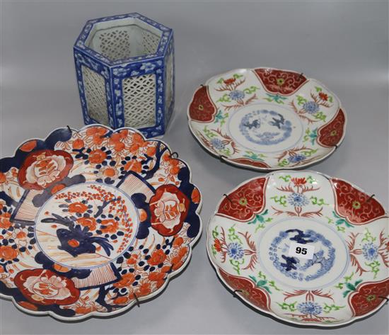 A pair of 19th century Imari saucer shaped dishes, one other larger and a Chinese blue and white